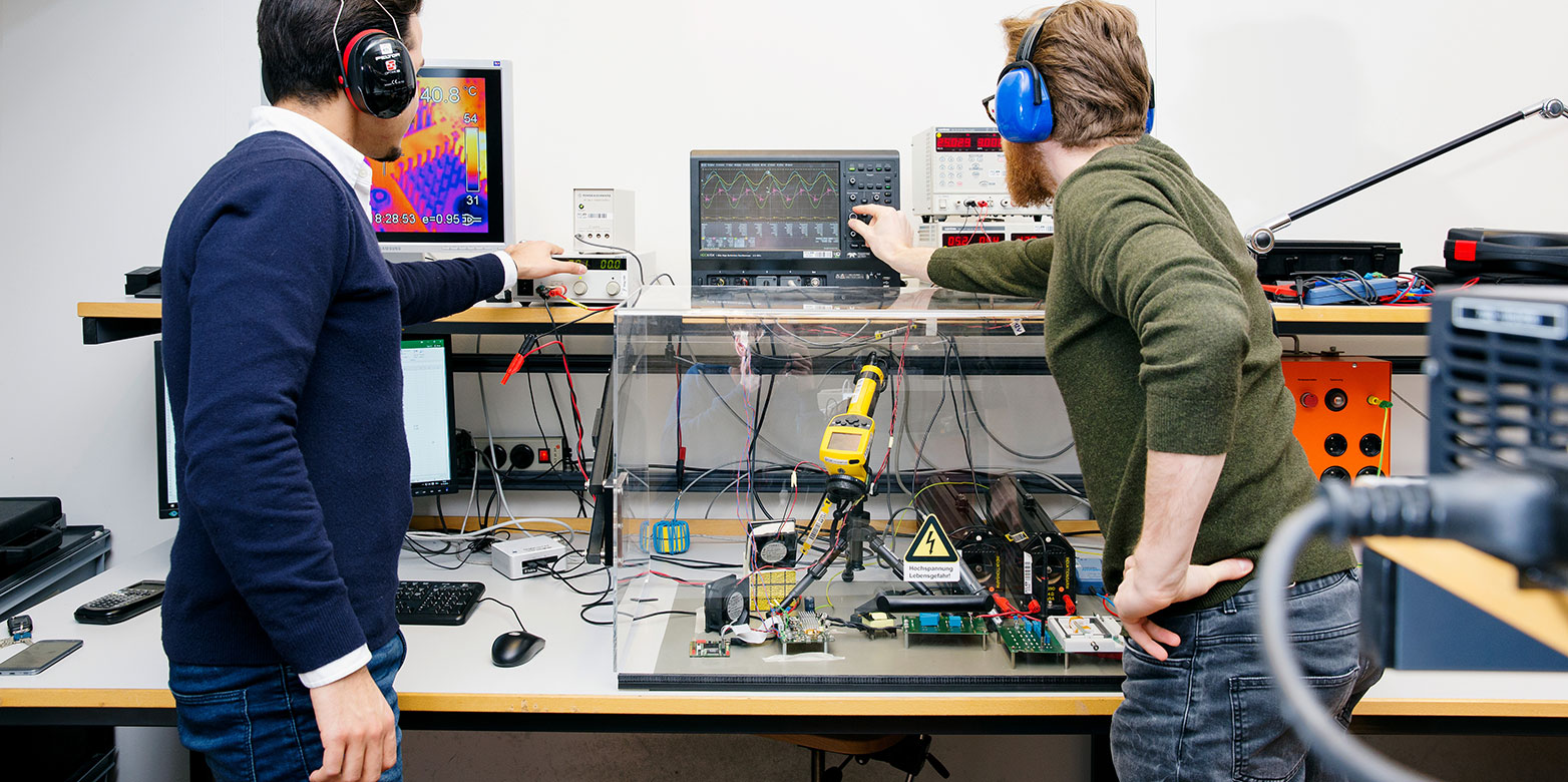 Two people working in the lab.